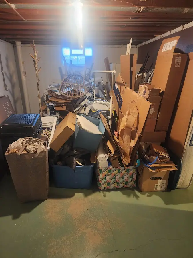 Roll-off dumpster container at job site for 2 Yard Dumpster Rental in Broadalbin